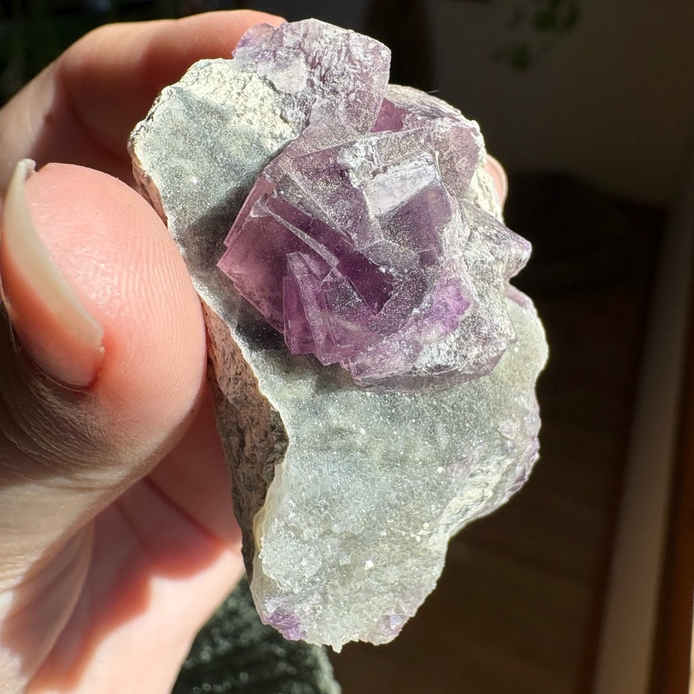 Purple fluorite on druzy chalcedony